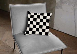Black and white checkered pattern pillow