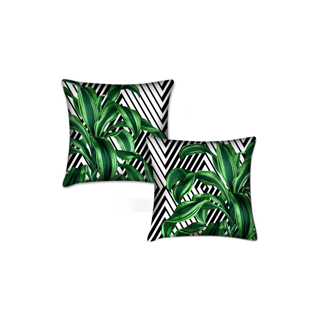 Tropical leaves pillows with geometrical accents. Set of 2