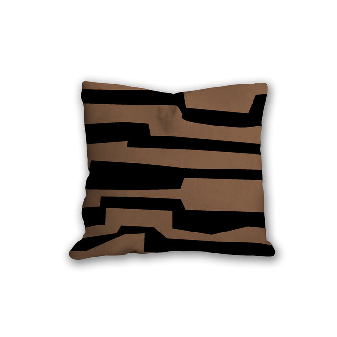 Brown and black pillow with labyrinth pattern